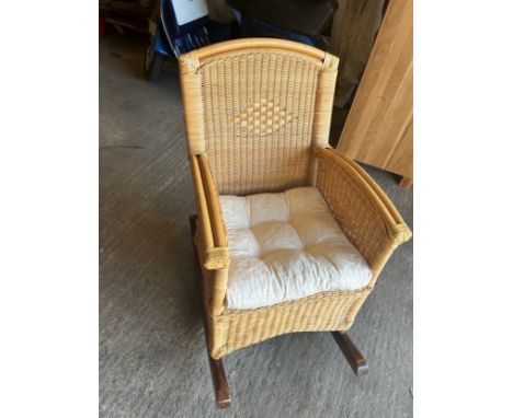 Vintage wicker rocking chair, approximate measurements: Height 36 inches, Width 24 inches, Depth 36 inches 