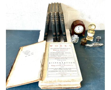 Assortment of items to include novelty lighters, world of wonder books, small mantel clock 