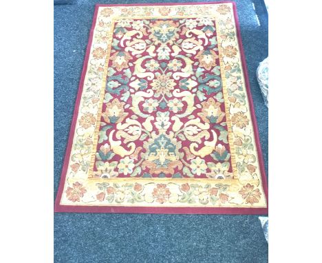Vintage patterned rug measures approx 67 inches long by 47.5 inches wide 
