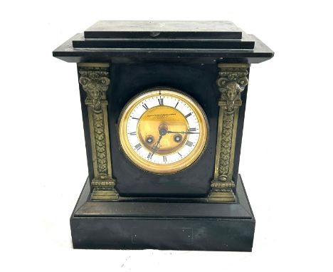 Vintage marble two key hole mantel clock with pendulum by the Goldsmith and Silversmith company London measures approx 11 inc