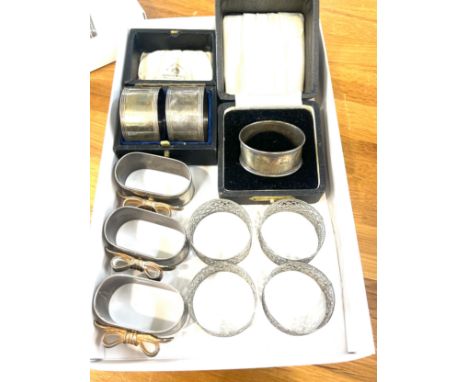 Large selection of assorted napkin rings includes cased mapin and webb and a cased silver napkin ring 