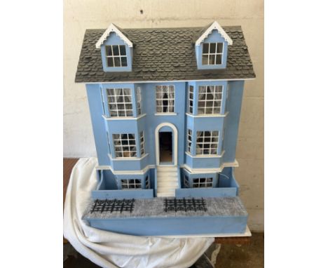 Large dolls house with a large selection of vintage and later dolls house furniture, measures approximately 33 inches tall 23
