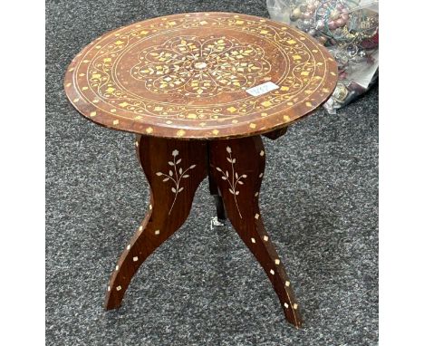 Vintage three legged inlaid folding table measures approx 14 inches tall by 13 inches diameter 