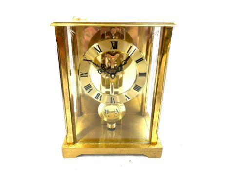 Vintage brass mantel clock signed S.Haller Germany measures approx 8 inches tall by 5.5 inches wide 
