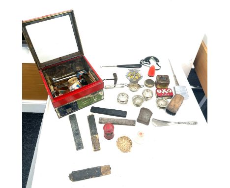 Antique shop display biscuit tin, glass topped hinged lid, containing many small objects d'art, antique hand tools, 1930's tr