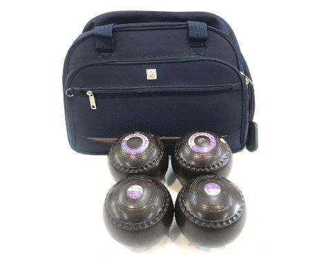 Set of vintage four bowls and a bag ' Leicester Banks Bowls Club' 