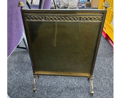 Vintage brass fire screen measures approx 28 inches tall by 19.5 inches wide 