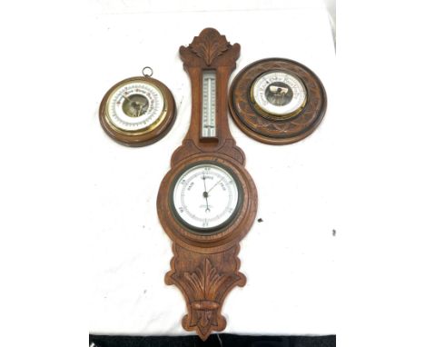 Selection of vintage wooden wall hanging barometers largest measures approx 27.5 inches long 
