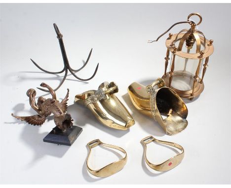 Works of art, to include a wall light in the form of a winged figure, a hook, a pair of stirrup shoes and a brass hanging lam