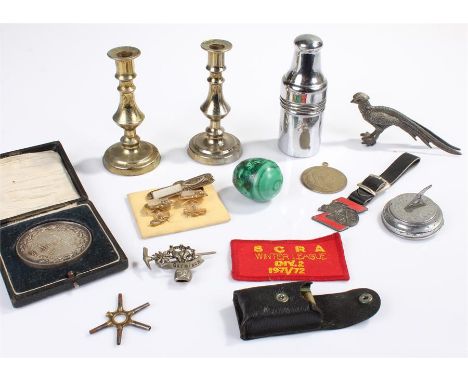 Mixed lot to include a silver medallion for Dr Barnardo's homes, a Garmisch brooch, two miniature candlestick, glass bottle i