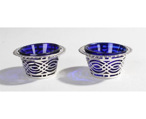 Two silver salts with blue liners in pierced baskets Birmingham 1903 makers R&W 