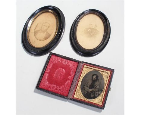 Ambrotype portrait of a woman, together with two framed Victorian photographs (3) 