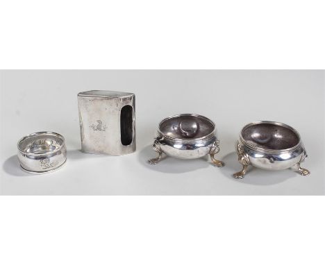 Two silver salts, with hoof feet, a napkin ring and a match box holder.marks mostly indistinct. (4) 5.3oz