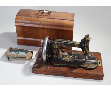 Vintage sewing machine in wooden case