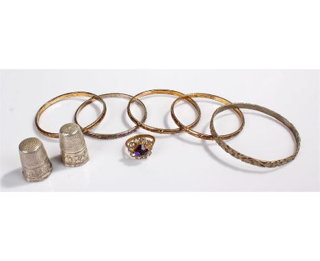 Mixed lot, including a silver thimble, Chester 1912, five bangles one marked 579 silver, a ring, and a second thimble 