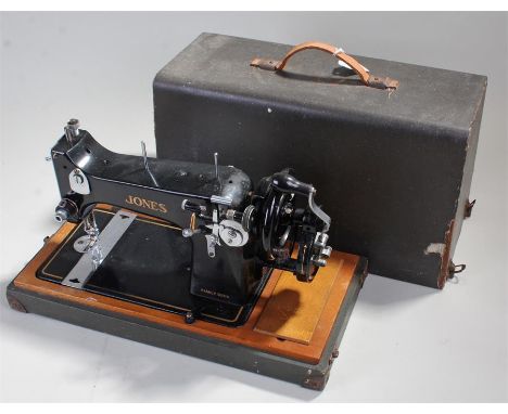 Circa 1940s Vintage Jones sewing machine, model D53, in plywood case