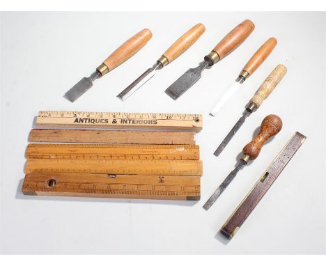 Collection of tools, including a James Howarth spirit level, wooden rulers, and chisels (qty) 