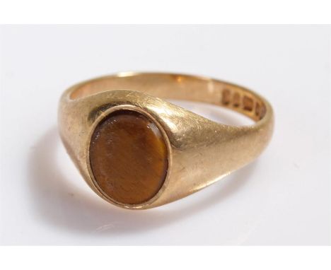 9 carat gold tigers eye signet ring, set with an oval tigers eye
