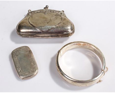 Silver objects, to include a silver purse, a silver vesta case and a silver bangle, (3)