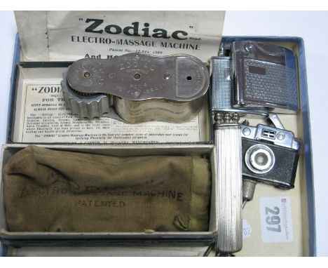 ZODIAC Electro Massage Machine, in original fabric pouch and box with leaflet; novelty camera lighter (stamped "Made in Occup