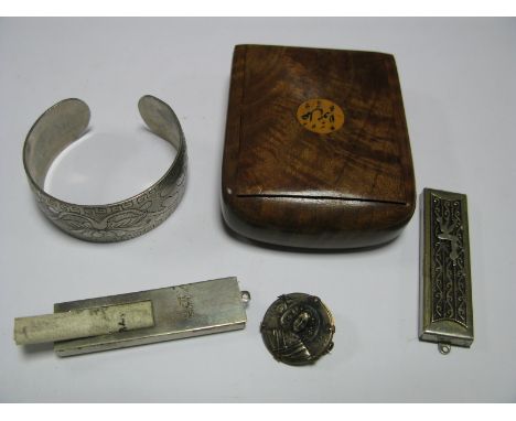 Two Textured Panel Style Pieces, with scroll inside, stamped "Made in Israel", a patterned bangle, of foliate design, hinged 