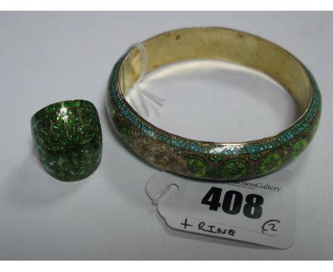 An Indian Green Enamel Bangle, of foliate design (lacking enamel in parts), with matching ring.