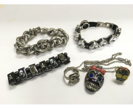Two skull rings, a similar pendant and three bracelets (6).