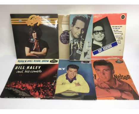 A collection of rock n roll LPs bu various artists including Eddie Cochran, Elvis Presley, Ricky Nelson and others plus a Les