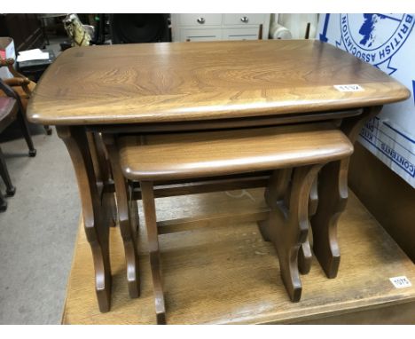 An Ercole nest of light wood tables.