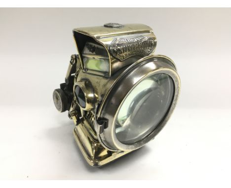 A Joseph Lucas Ltd 'Silver King' oil bicycle lamp, dated 1924.
