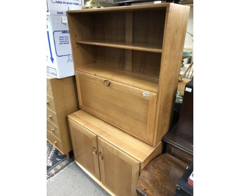 An Ercole light wood bureau bookcase. 163 x 91cm.