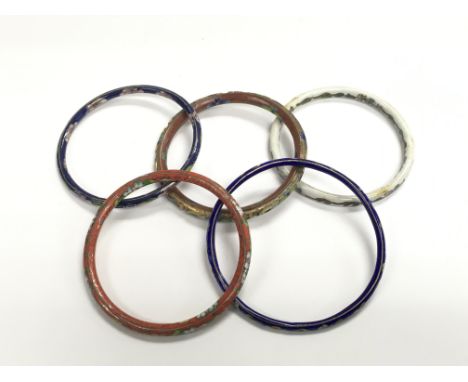 Five narrow enamel bracelets.