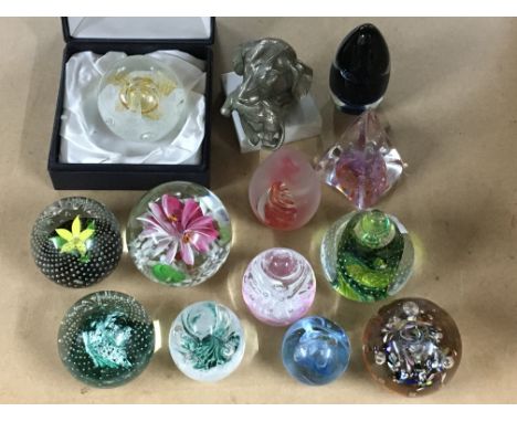 A collection of paperweights including a boxed Caithness weight - NO RESERVE