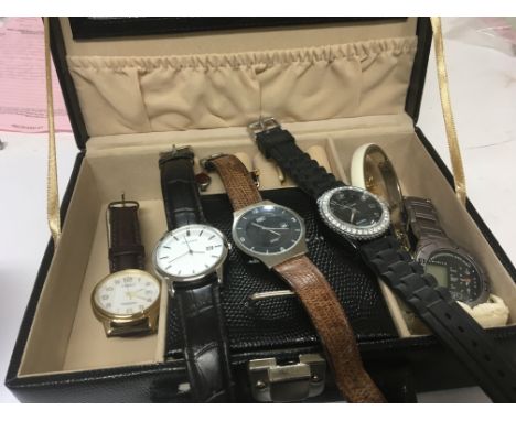 A black jewellery case containing gents watches including Timex Sekonda CL and costume jewellery some watches seen working