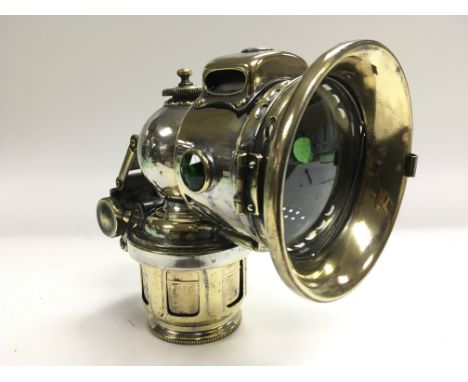 A Joseph Lucas Ltd 'King of the road' carbide bicycle lamp, dated 1924.