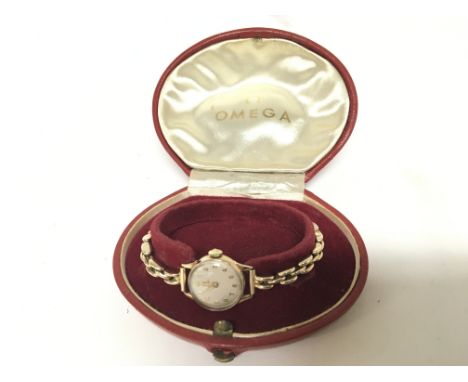 A ladies 9carat gold Omega wrist watch with original 9carat gold bracelet attached manual wind in a fitted box.