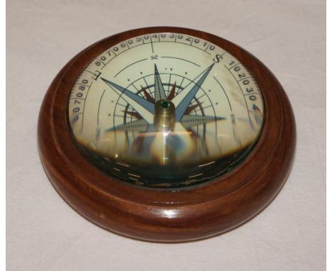 Domed glass and wooden based compass