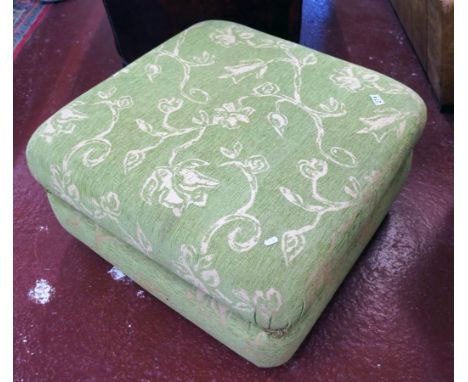 Large green upholstered pouffe