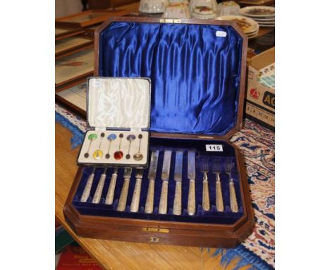 Canteen of cutlery in oak case with boxed set of silver and enamel spoons