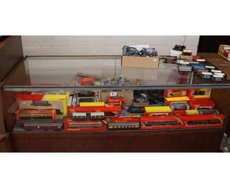 Very large collection of model trains, track, model cars etc (contents of cabinet)