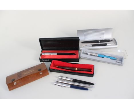 A selection of vintage Parker pens, ink and ballpoint