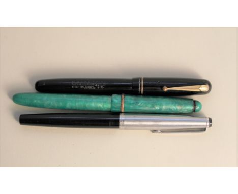 Three vintage ink pens, one marked Mont Blanc Monte Rose, an Osmiroid 65 and a Swan Parker Duofold with 14ct gold nib