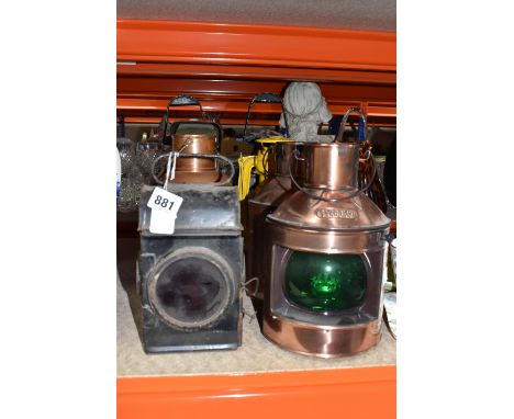 A GROUP OF LAMPS AND LANTERNS, comprising a black painted railway lamp, unmarked with a painted '33', a pair of reproduction 