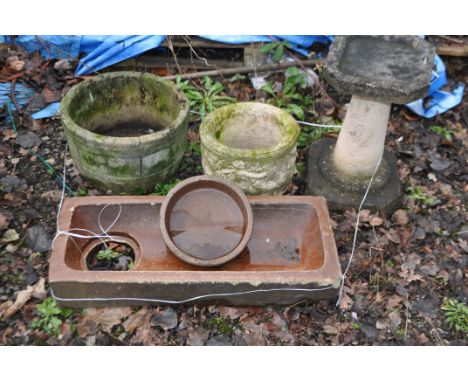 A TREACLE GLAZED WATER TROUGH AND THREE CONCRETE POTS AND BIRD BATH, trough width 68cm, depth 28cm, height 10cm.(5). Conditio