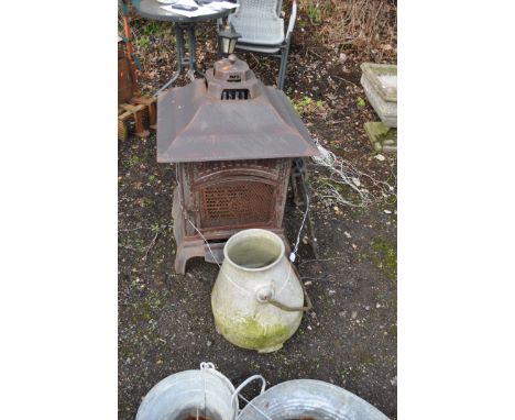 A MODERN STEEL PAGODA  STYLE GARDEN LOG BURNER with mesh sides and flue roof height 82cm, a fire grate front and a milk churn