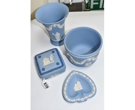 FOUR PIECES OF WEDGWOOD JASPERWARE, in pale blue, comprising a tapering footed vase, height 15cm, a small planter, height 11c