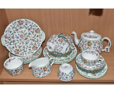 TWENTY SEVEN PIECES OF MINTON 'HADDON HALL' TEA WARES comprising a tea pot, a sugar bowl, a milk jug (sizeable chip to the ri