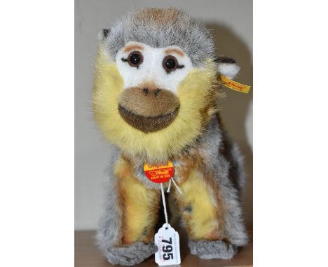 A STEIFF 'JUMPING MONKEY' serial numbered 120053, with an original gold-plated ear button and original swing tag, height 14cm
