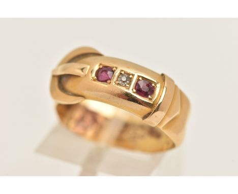 A LATE VICTORIAN 18CT GOLD DIAMOND AND RUBY BUCKLE RING, AF set with one old cut diamond and two rubies, hallmarked 18ct gold