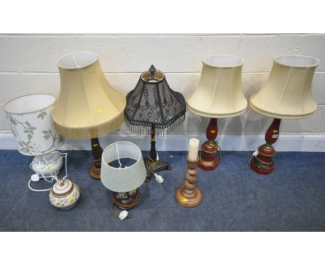 A PAIR OF RED AND GOLD TABLE LAMPS, height to fitting 53cm, an oak lamp, three ceramic lamps, another lamp, and an oak barley